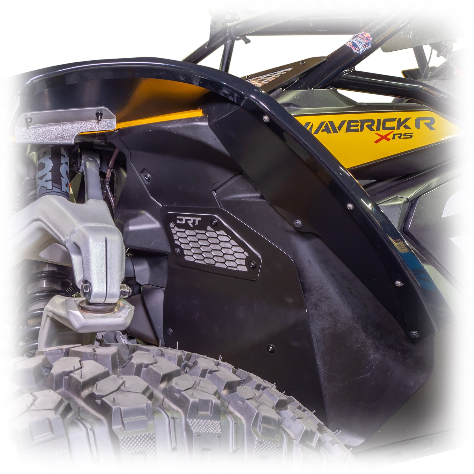 Close-up of a front aluminum rock guard installed on a Maverick R.