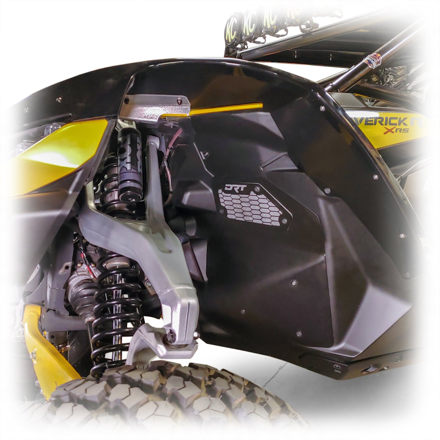 Close-up of a front aluminum rock guard installed on a Maverick R.