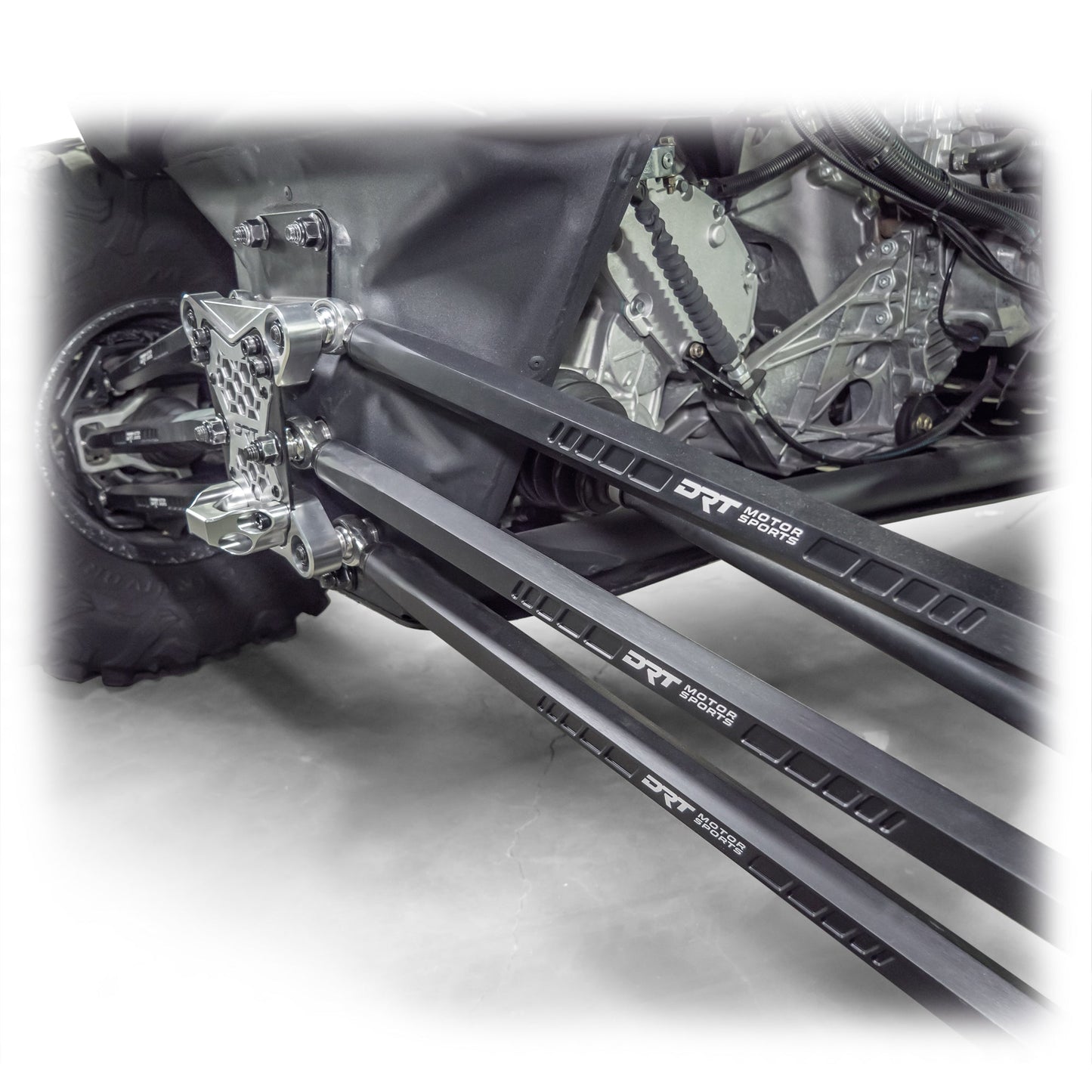 DRT Can-Am Maverick X3 2017+ Billet Aluminum 3-PC Radius Rod Plate Kit Full rear view from an angle