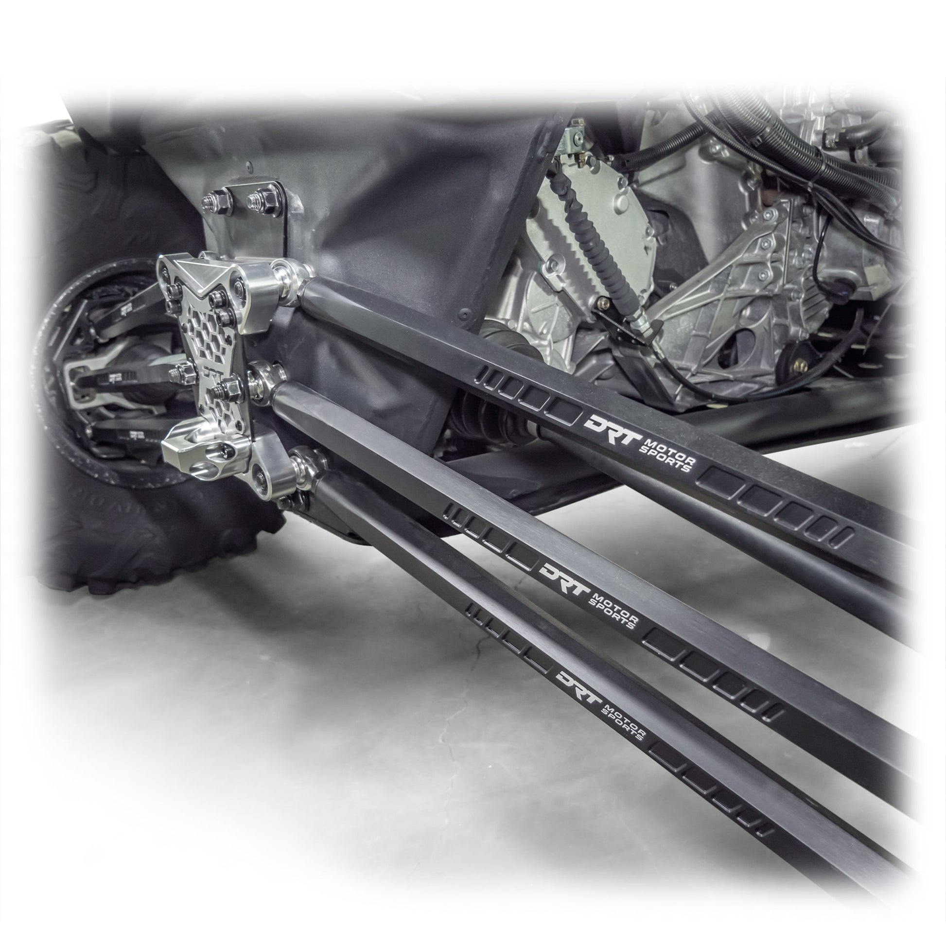 DRT Can-Am Maverick X3 2017+ Billet Aluminum 3-PC Radius Rod Plate Kit Full rear view from an angle