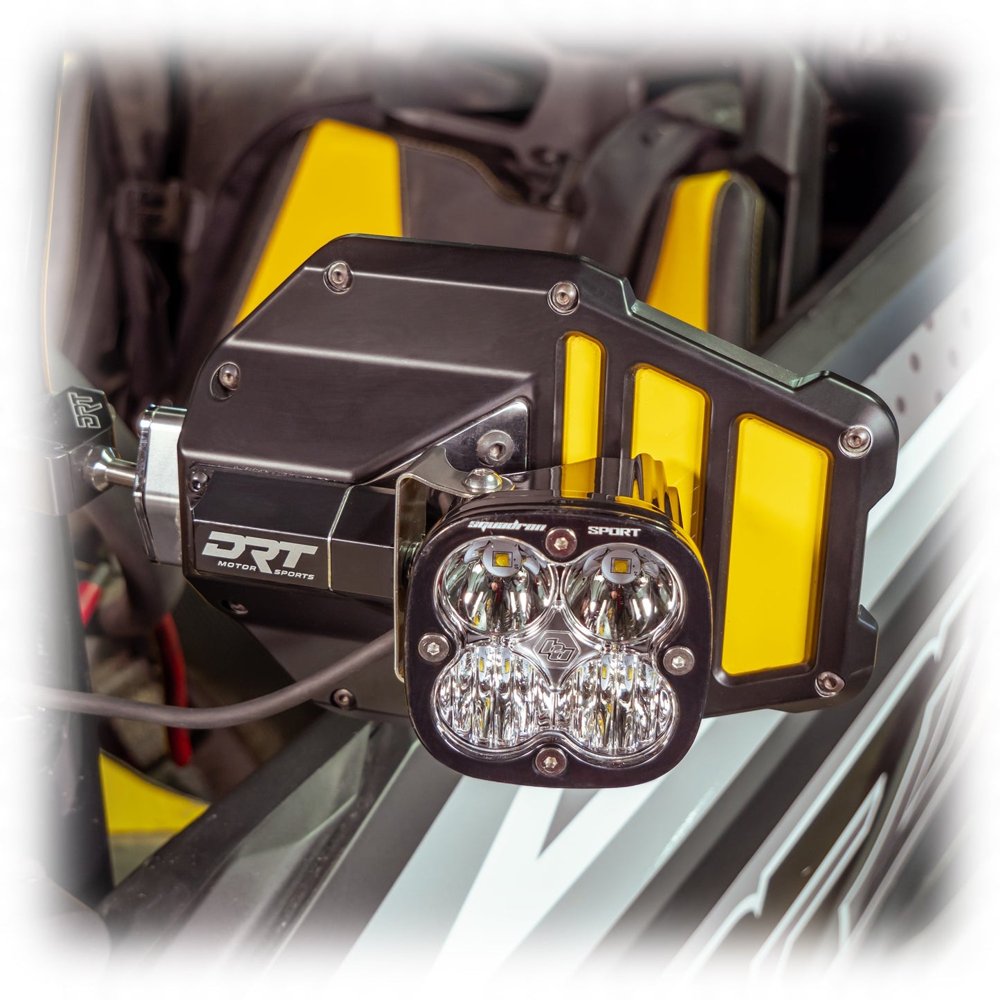 Tactical mirror light bracket kit installed on UTV mirror with light mounted