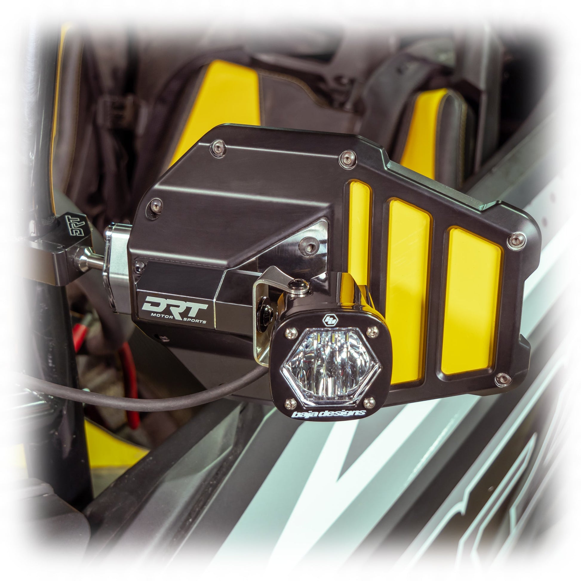 Tactical mirror light bracket kit installed on UTV mirror with light mounted