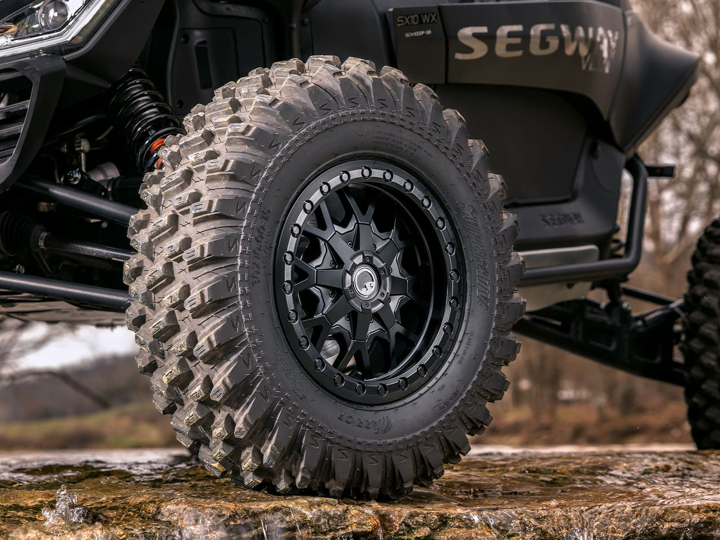 Standard XT Warrior Tires 32x10x15 on 15x7 Assault Industries Hellfire Matte Titanium Wheels 4/136 Pattern