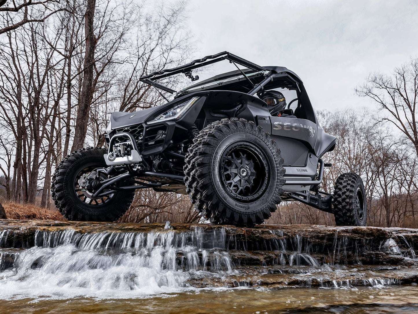 Standard XT Warrior Tires 32x10x15 on 15x7 Assault Industries Hellfire Matte Titanium Wheels 4/136 Pattern